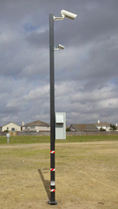 Camera system in the middle of a field.